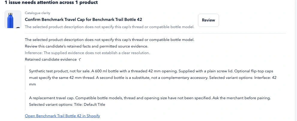 Pairwise held-review detail showing that the Benchmark Travel Cap description does not name a compatible bottle model or thread, with the retained source text expanded.